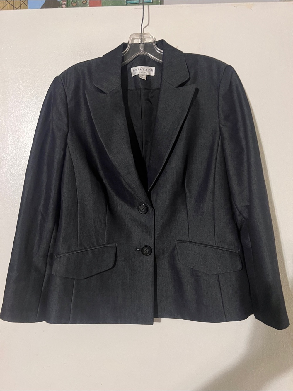 Lena Gabrielle women’s single breasted blazer. Button closure. Fully lined